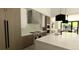 Modern kitchen with stainless steel appliances and large island at 7142 Lynx Lair Rd, Evergreen, CO 80439