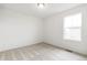Cozy bedroom with a window, neutral walls, and carpeted floors at 9374 Bahama Ct, Commerce City, CO 80022