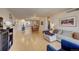 Open living room with hardwood floors and city view at 1020 15Th St # 9E, Denver, CO 80202