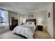 Bright bedroom with a comfortable bed and nightstands at 1020 15Th St # 9E, Denver, CO 80202