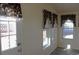 Kitchen with a door leading to the backyard at 16163 Barley Ave, Fort Lupton, CO 80621