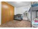 Cozy bedroom with wood closet doors, a crib, and a bunk bed at 8140 S Fillmore Cir, Centennial, CO 80122
