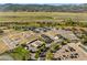 Aerial view showing new homes and surrounding landscape at 8242 S Pierson St, Littleton, CO 80127