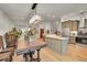 Open concept kitchen with large island and stainless steel appliances at 6034 S Niagara Ct, Centennial, CO 80111