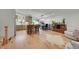 Open concept kitchen with island, hardwood floors, and modern appliances at 6034 S Niagara Ct, Centennial, CO 80111