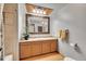 Updated bathroom with tiled shower, vanity, and wood flooring at 6034 S Niagara Ct, Centennial, CO 80111