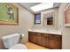 Clean bathroom with a vanity, toilet and mirror at 6034 S Niagara Ct, Centennial, CO 80111