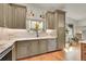 Modern kitchen with stainless steel appliances and white marble counters at 6034 S Niagara Ct, Centennial, CO 80111
