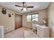 Charming bedroom with a desk and ceiling fan at 6034 S Niagara Ct, Centennial, CO 80111
