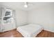 Cozy bedroom with hardwood floors and window coverings at 11868 High Desert Rd, Parker, CO 80134