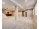Finished basement with large open space, wet bar, and carpeted floor at 314 Castlemaine Ct, Castle Rock, CO 80104