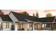 House exterior showcasing a large back patio and an attached garage at 314 Castlemaine Ct, Castle Rock, CO 80104