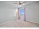 Spacious bedroom with ceiling fan and window coverings at 42888 Ivydel St, Elizabeth, CO 80107