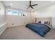 Bright bedroom with a comfortable bed and ceiling fan at 2975 Piper S Dr, Erie, CO 80516