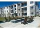 Relaxing community firepit with seating area at 6153 N Ceylon St # 201, Denver, CO 80249