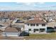 View from above the home, showcasing the roof, backyard, and detached garage at 2460 S Clay St, Denver, CO 80219