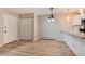 Bright dining area with hardwood floors and access to kitchen at 3575 28Th St # 102, Boulder, CO 80301