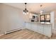 Modern kitchen with white shaker cabinets and granite countertops at 3575 28Th St # 102, Boulder, CO 80301