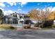 Community pool area with surrounding landscaping and building view at 3575 28Th St # 102, Boulder, CO 80301