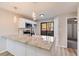 Modern kitchen with granite countertops, white cabinets at 3575 28Th St # 102, Boulder, CO 80301
