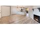 Open living room with fireplace and hardwood floors at 3575 28Th St # 102, Boulder, CO 80301