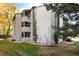 Exterior view of condo building showcasing landscaping and balconies at 3575 28Th St # 102, Boulder, CO 80301