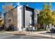 Exterior view of condo building from street, showing landscaping at 3575 28Th St # 102, Boulder, CO 80301