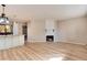 Living area with fireplace and hardwood floors at 3575 28Th St # 102, Boulder, CO 80301