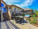 Outdoor patio with hot tub and seating area, perfect for entertaining at 9022 Jason Ct, Boulder, CO 80303