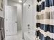 Clean basement bathroom with a shower/tub combo and striped shower curtain at 9022 Jason Ct, Boulder, CO 80303