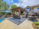 Outdoor kitchen with a built-in grill and bar seating at 9022 Jason Ct, Boulder, CO 80303