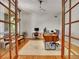 Bright home office with built-in desk and double doors at 9022 Jason Ct, Boulder, CO 80303