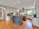Gourmet kitchen boasts a large island, stainless steel appliances, and ample cabinetry at 9022 Jason Ct, Boulder, CO 80303
