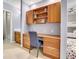 Basement bedroom with built-in desk and shelving, perfect for studying or working at 9022 Jason Ct, Boulder, CO 80303