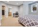 Comfortable basement bedroom with a desk and en-suite bathroom at 9022 Jason Ct, Boulder, CO 80303