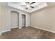 Basement bedroom with carpeted floor and ceiling fan at 4553 Osceola St, Denver, CO 80212