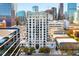 Aerial view of a high rise building in the city at 1827 N Grant St # 1000, Denver, CO 80203