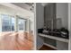 Modern entryway with black console table at 1700 Bassett St # 1321, Denver, CO 80202