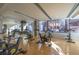 Fitness center with spin bikes and large windows at 1700 Bassett St # 1321, Denver, CO 80202