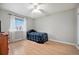 Simple bedroom with twin bed and wood flooring at 9005 W Bellwood Pl, Littleton, CO 80123