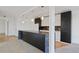 Modern kitchen with dark cabinetry and granite island at 3100 E Cherry Creek Drive South S Dr # 501, Denver, CO 80209