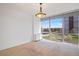 Bright dining room with large windows offering city views at 3100 E Cherry Creek Drive South S Dr # 501, Denver, CO 80209