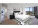 Bright bedroom with tiled floors and large window at 3100 E Cherry Creek Drive South S Dr # 501, Denver, CO 80209