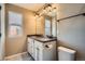 Double vanity bathroom with updated fixtures and neutral color scheme at 9535 E Alabama Cir, Denver, CO 80247