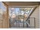 Balcony view showcasing surrounding landscape and trees at 4882 E Kentucky Ave # C, Denver, CO 80246