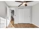 Bedroom with hardwood floors and double closets at 4882 E Kentucky Ave # C, Denver, CO 80246