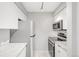 Modern galley kitchen, stainless steel appliances at 4882 E Kentucky Ave # C, Denver, CO 80246