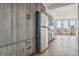 Modern kitchen with stainless steel appliances and wood cabinets at 3575 Chestnut Pl # 606, Denver, CO 80216