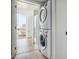 Convenient laundry room with stackable washer and dryer at 3575 Chestnut Pl # 606, Denver, CO 80216