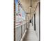 Exterior hallway with brick columns and city views at 3575 Chestnut Pl # 606, Denver, CO 80216